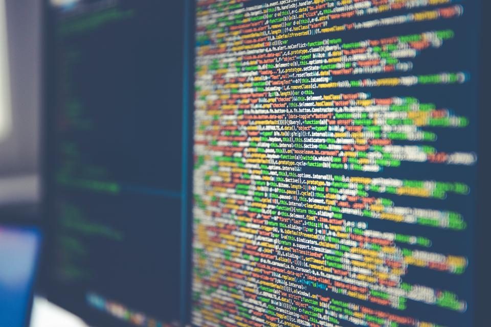 Close-up of source code on a screen during a technical audit