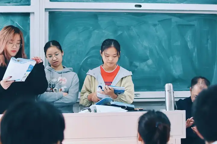 Students working at desks in a classroom